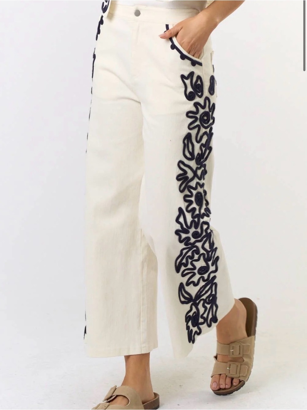 Cream Wide-Leg Pants with Black Floral Appliqué